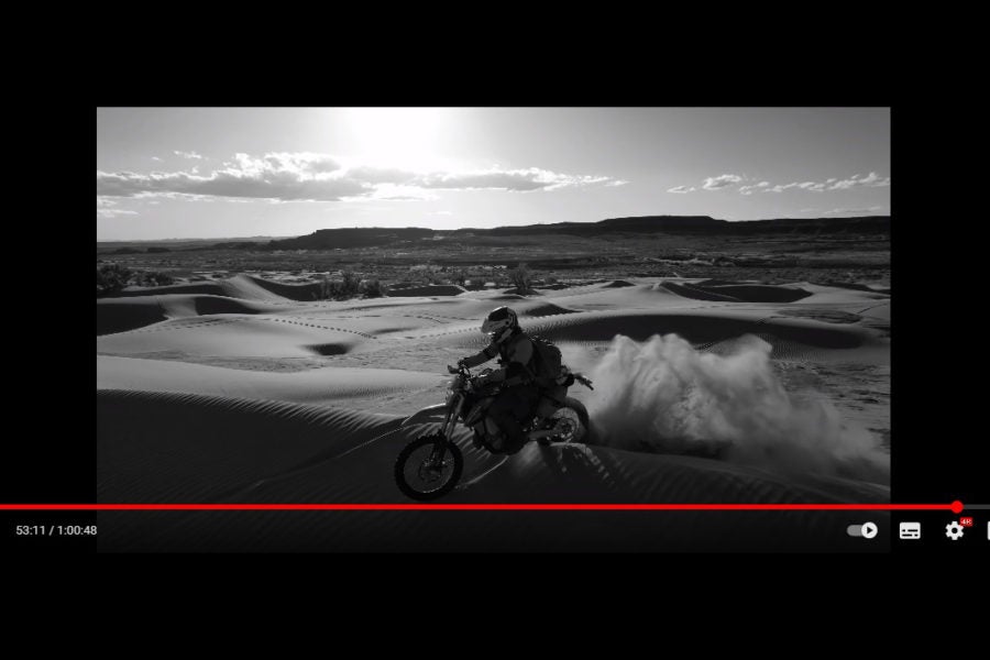 Ed March rides Moab … but leaves his Honda C90 at home?