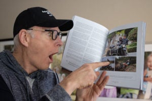 Baldy shows off a previous issue of the ADVrider print mag.