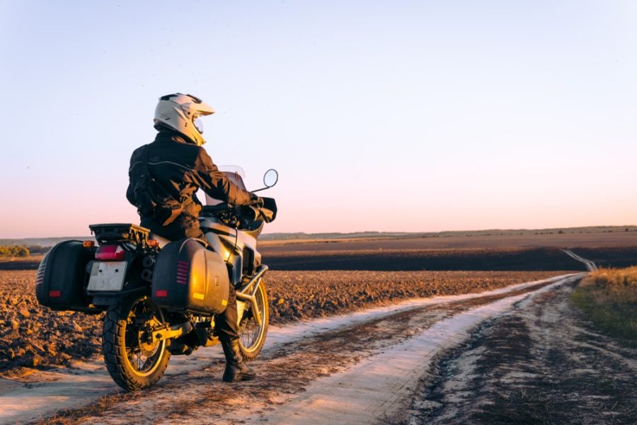 Are you able to put both feet down at a stop? Or does a tall motorcycle seat turn you off of ADV and dual sport bikes? There are options, if that's the case. Photo: Sergey Nemirovsky/Shutterstock.com